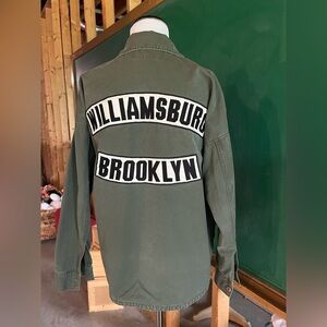 Moussy brand field jacket. No size listed. Army green.